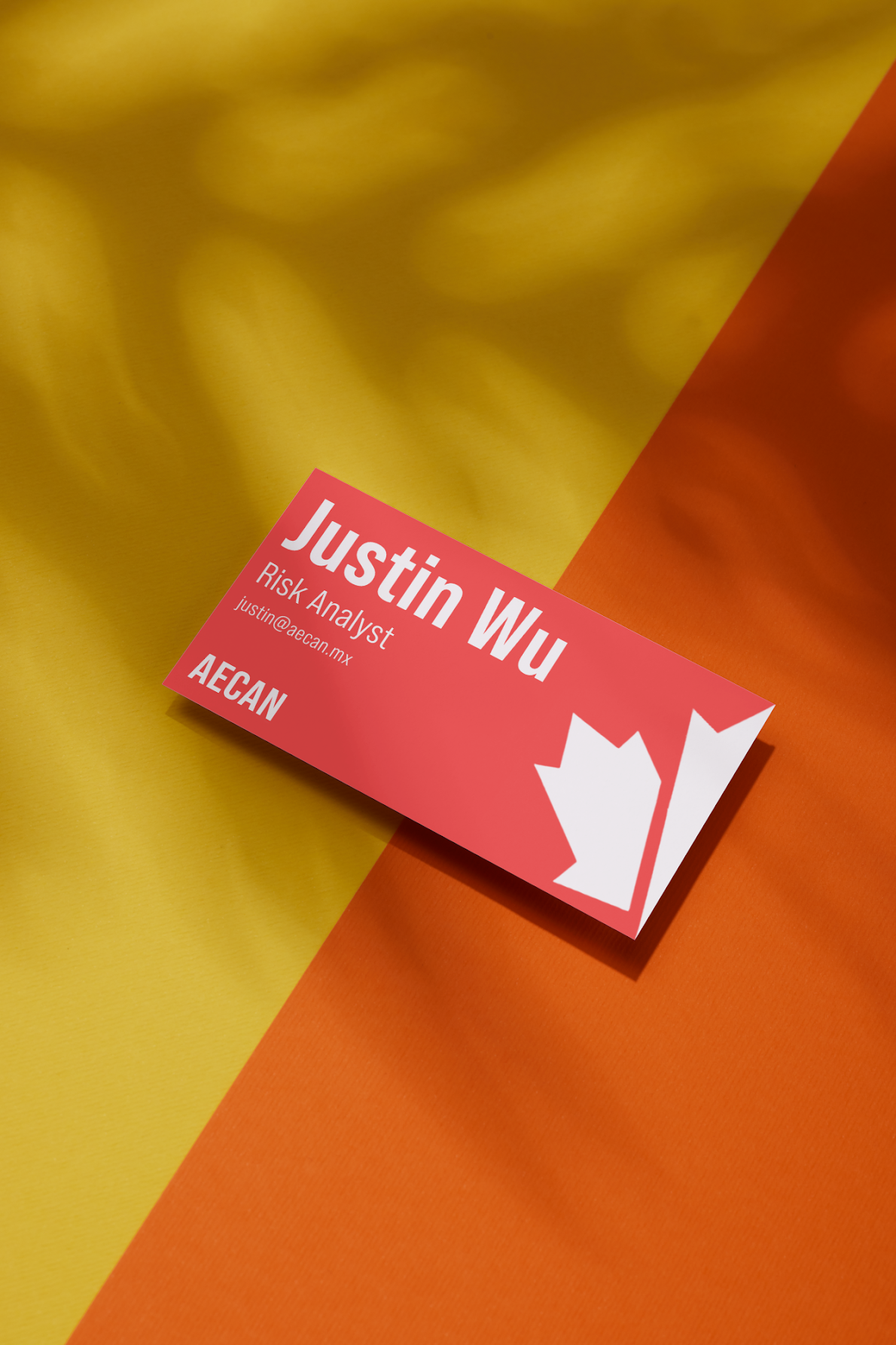 AECAN business card for Justin Wu, Risk Analyst, on a yellow-to-orange autumn gradient with a white maple leaf